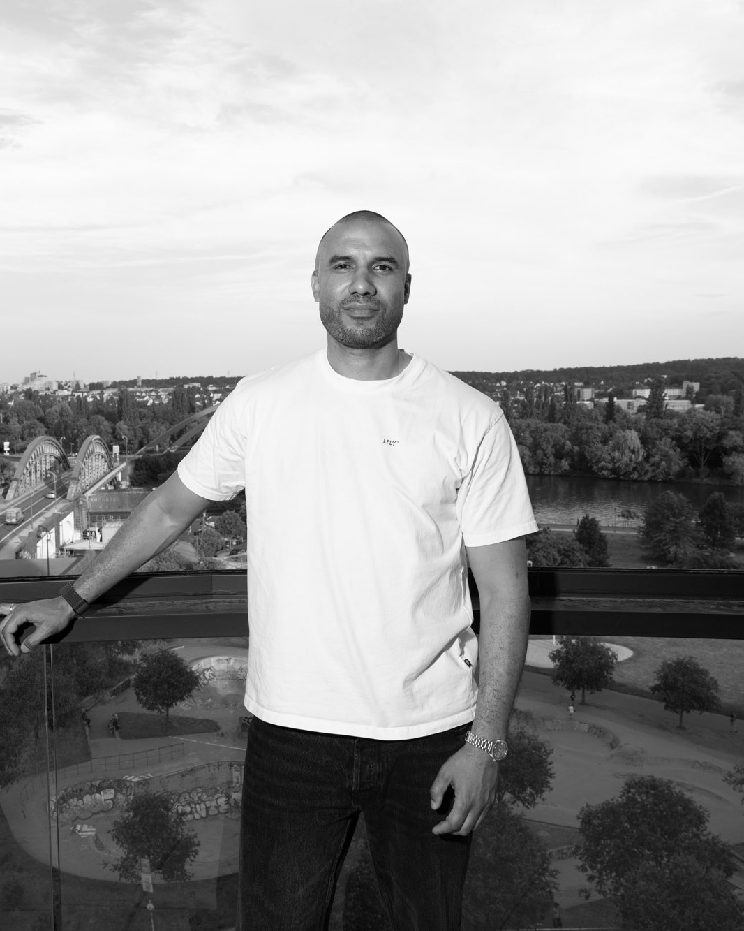 Portrait on a rooftop overlooking Frankfurt am Main